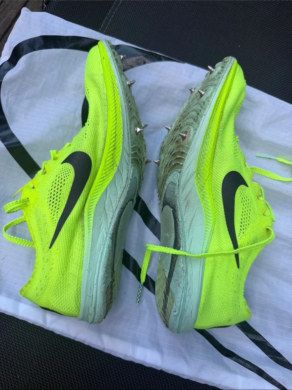 Nike Bright spikes, come with shoes bag